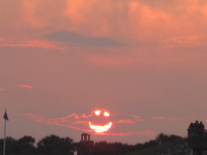 happy-face-sun-is-smiling-through-clouds.jpg