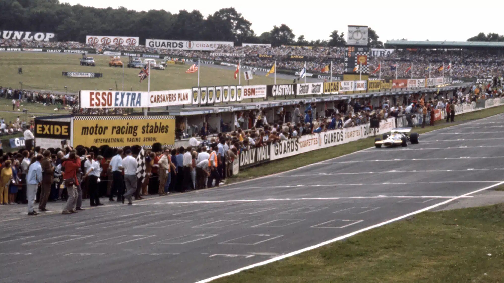 Jack-Brabham-coasts-to-the-finish-line-at-Brands-Hatch-to-take-second-place-at-the-1970-Britis...jpg